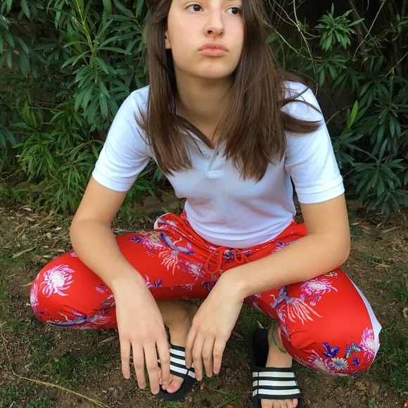 Red tracksuit pants with lining and bright print - Picture 2 of 4